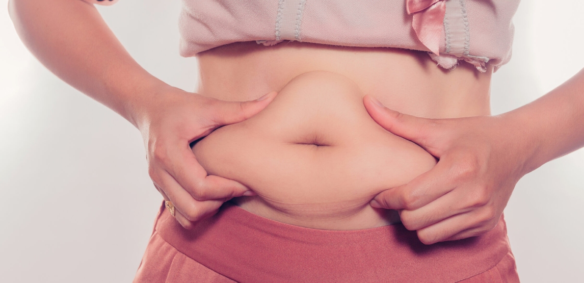 Abdominal Hardening After Liposuction: Causes, Solutions